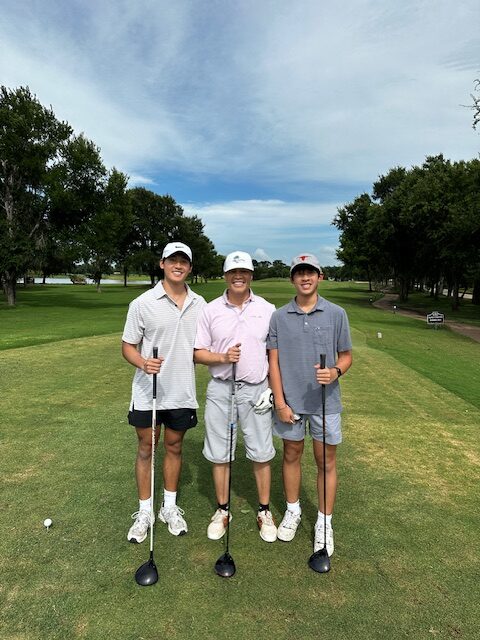 Dr. Dihn Glofing Dr. Dihn golfing with his sons.